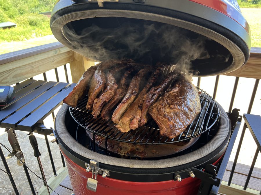 Beef ribs smoking on the grill
