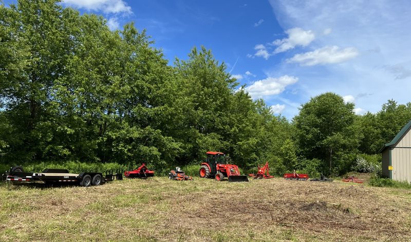 Farm tractors and equipment ready for work at Tompkins Farm